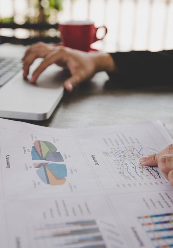 Businesswoman sitting in desk and work with financial documents company